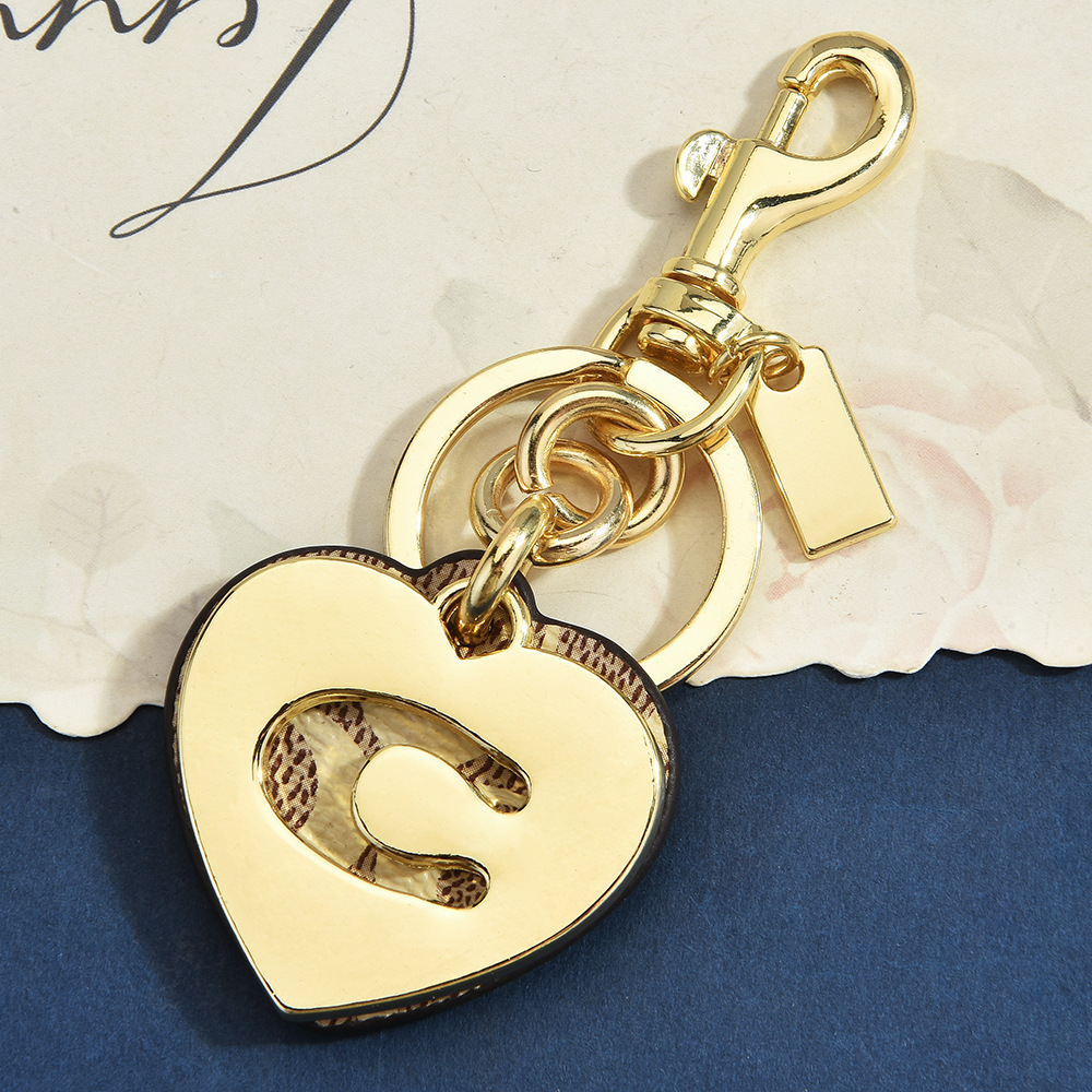 Monogramm-Herz-Blumen-Taschena – Monogram Keychain Leather Bewertung und Preis